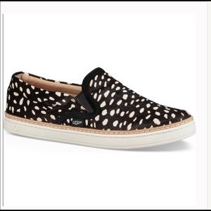 UGG Black White Calf Hair Soleda Slip On Sneakers.